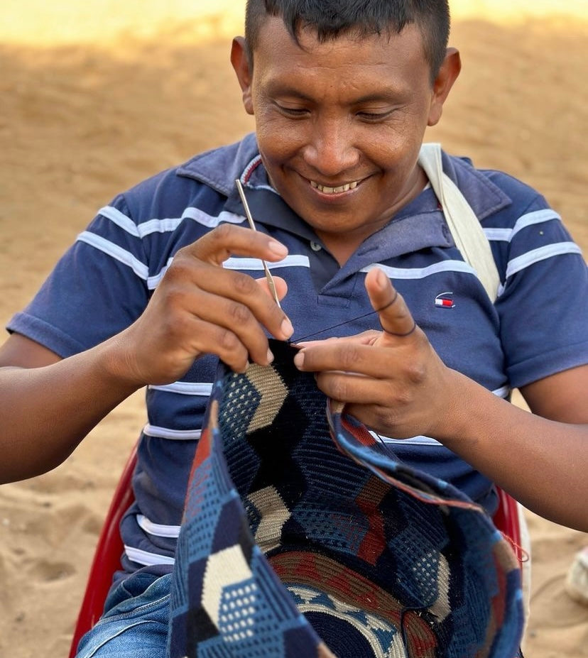 Breaking Traditions: revolutionary inclusion of men in Wayuu knitting culture.